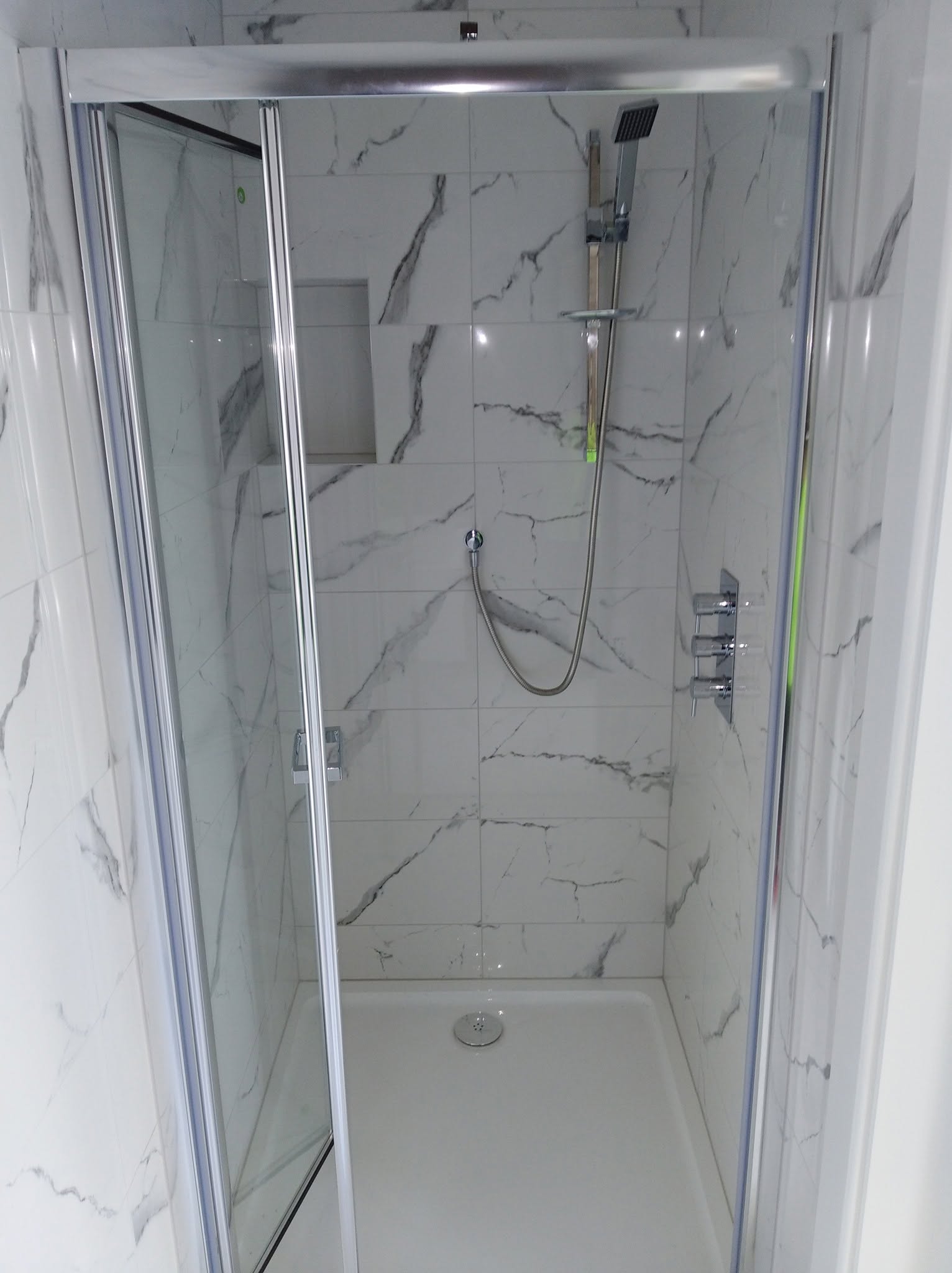 Bathroom shower installation with marble tiling Dublin